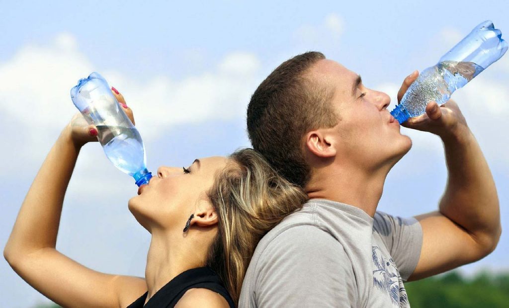 Filtered Water Health Benefits, couple drinking water